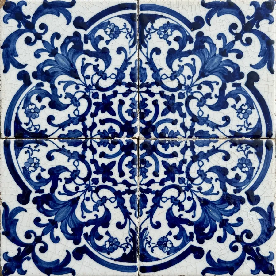 Detail of cobalt-blue Portuguese azulejo tiles with medallion motifs